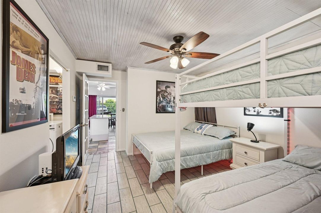 Bright bunk bedroom with storage