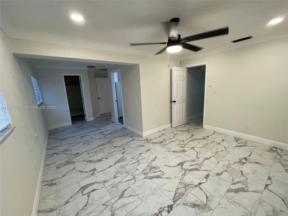Primary Bedroom has two extended areas for your furniture placement.