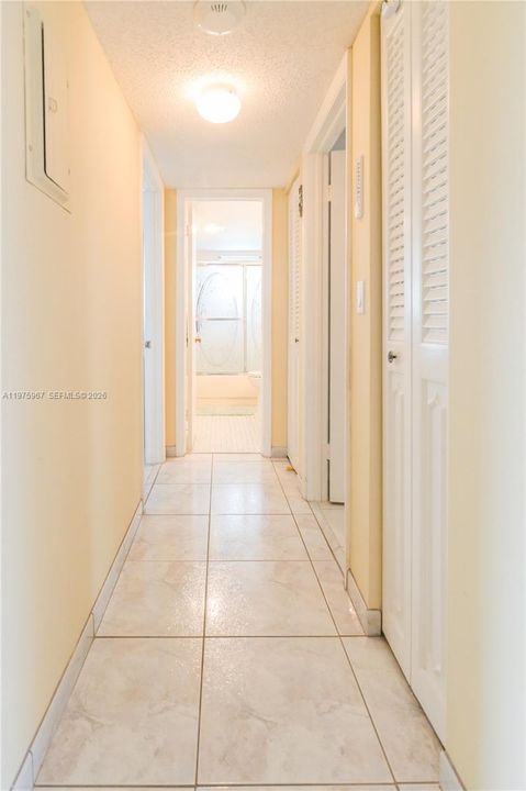 Hallway with closets