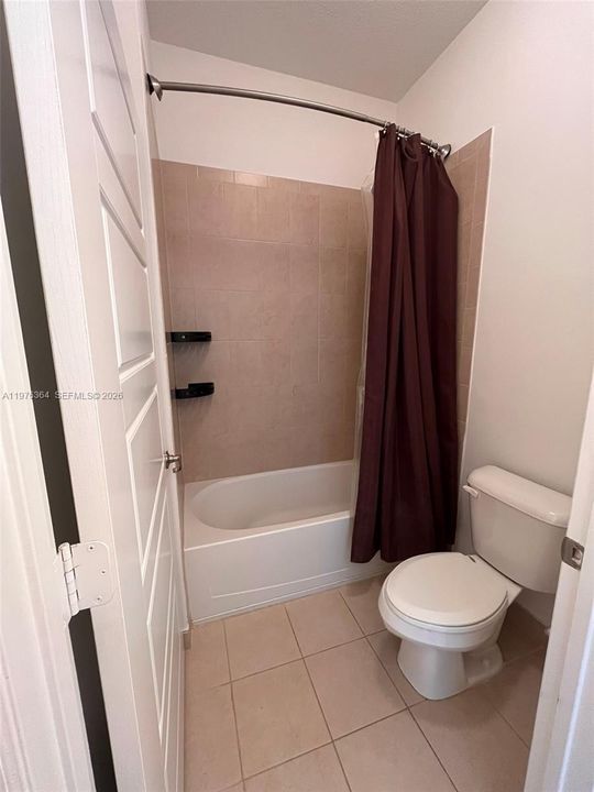 Separated tub/shower & toilet taken at 0.5