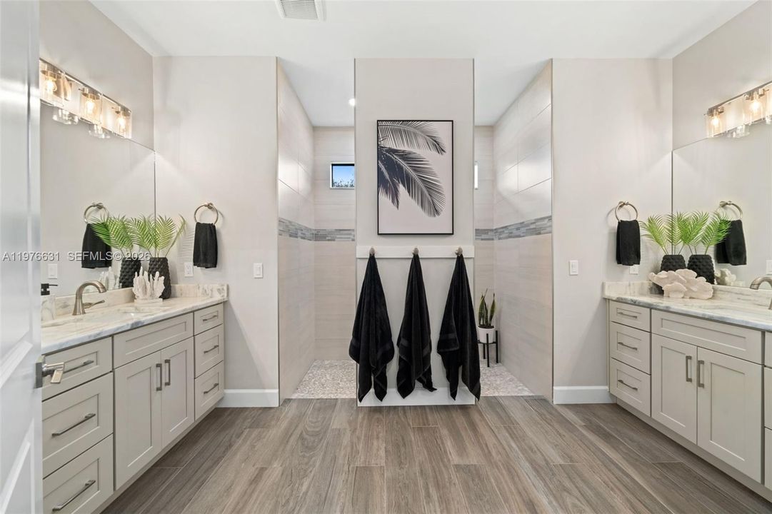 Dual vanities + upgraded finishes in primary bath