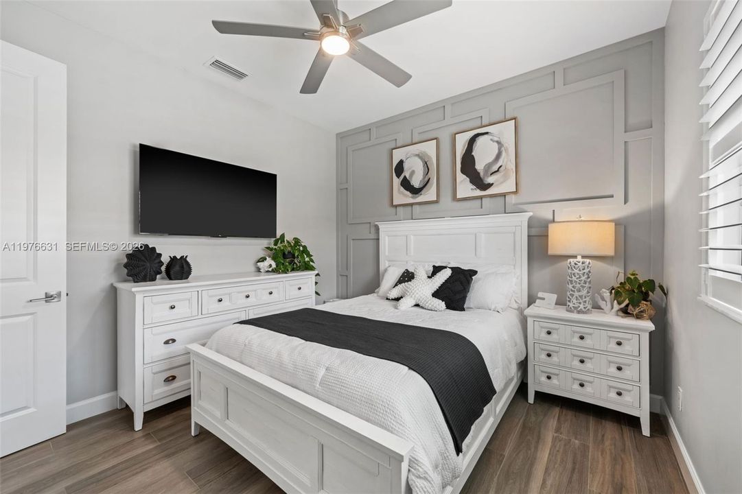 Bedroom 2 with custom accent wall
