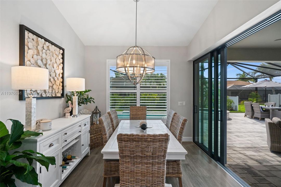Dining room and Zero-corner sliding doors to outdoors for seamless indoor-outdoor living