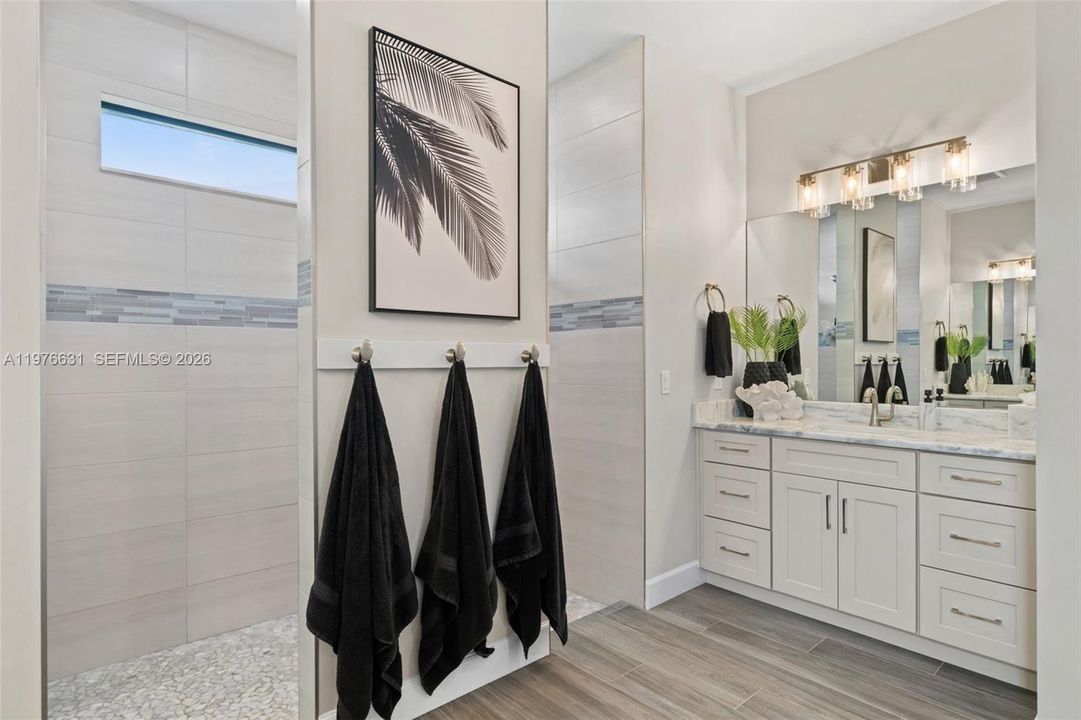 Oversized walk-around shower in the primary bath