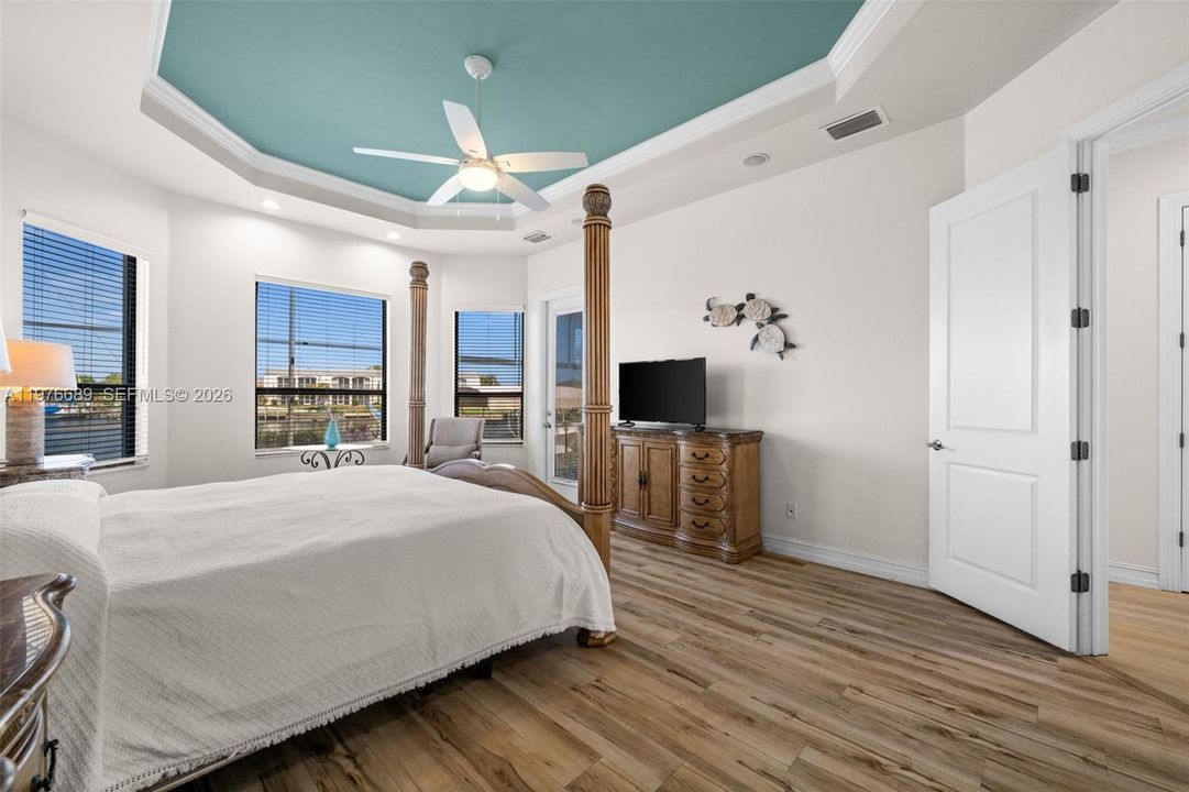 Primary Bedroom with way to the pool