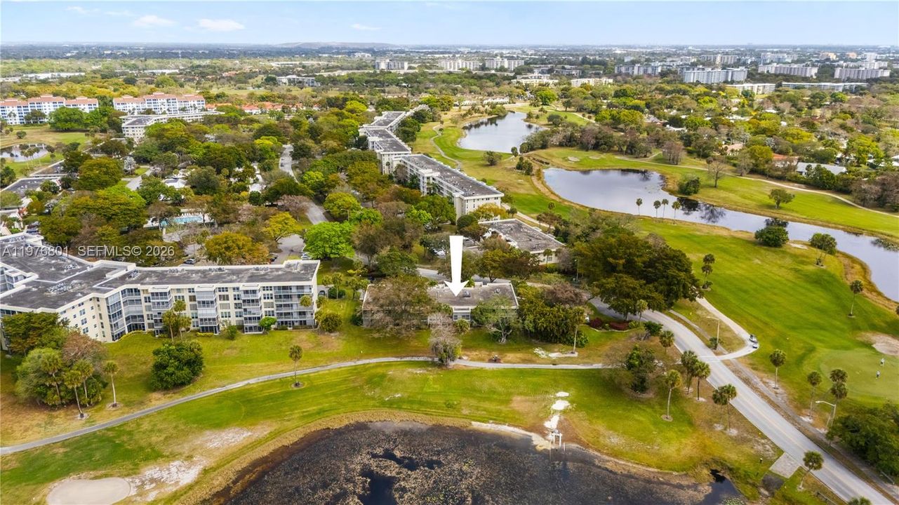 Aerial view with golf course and lake view