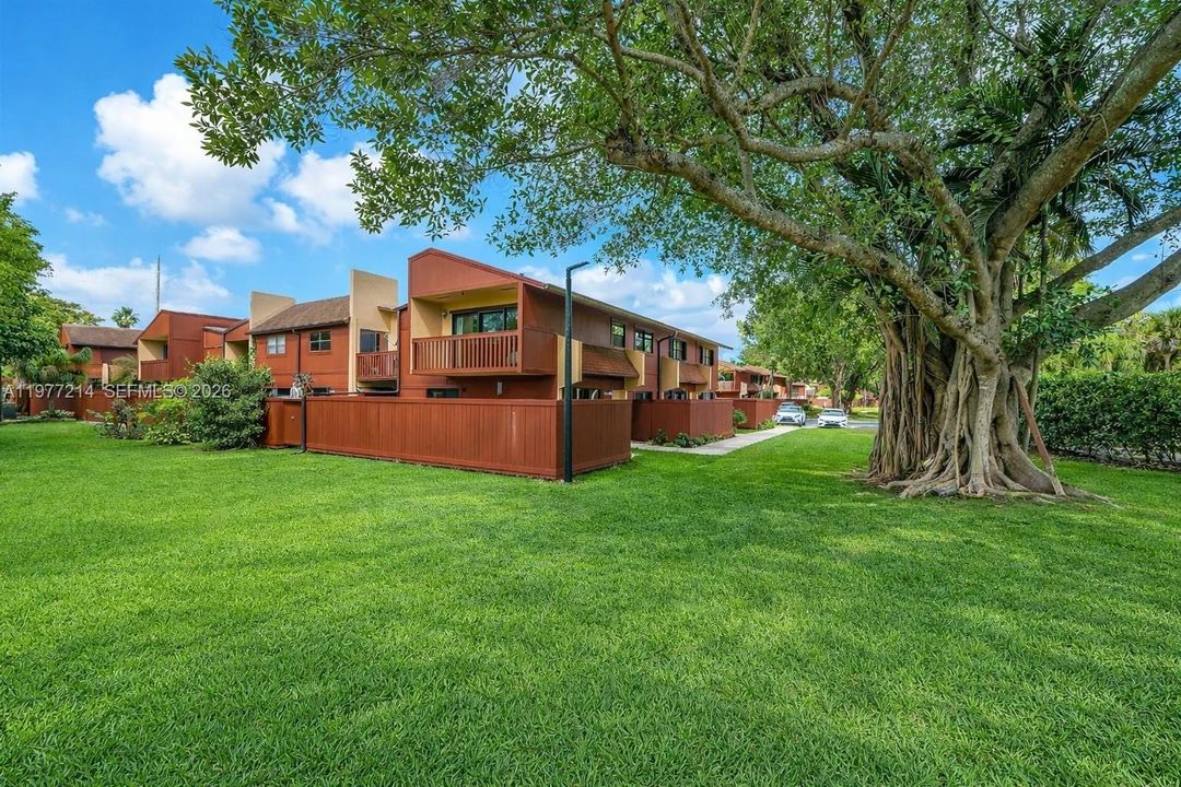 Corner Unit tucked in the back, overlooking a lush green space
