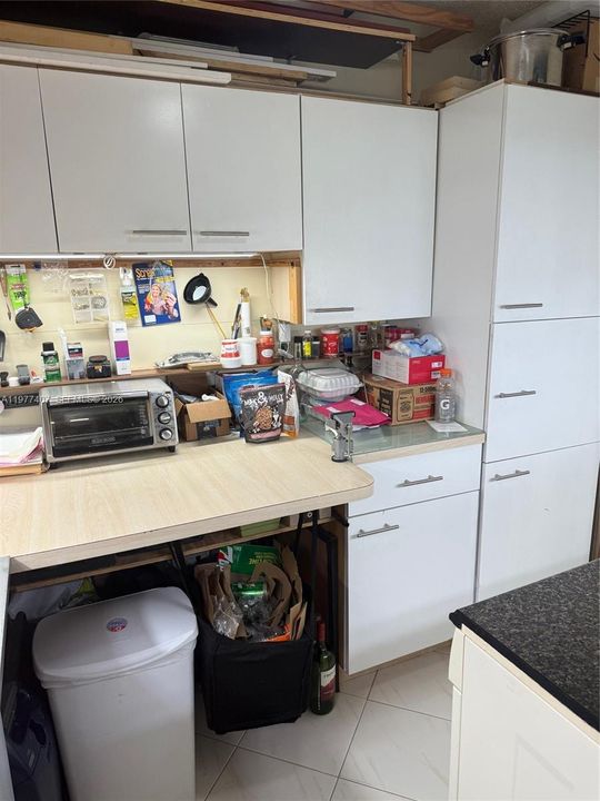 UTILITY/LAUNDRY/ WORK ROOM WITH TONS OF CLOSET SPACE