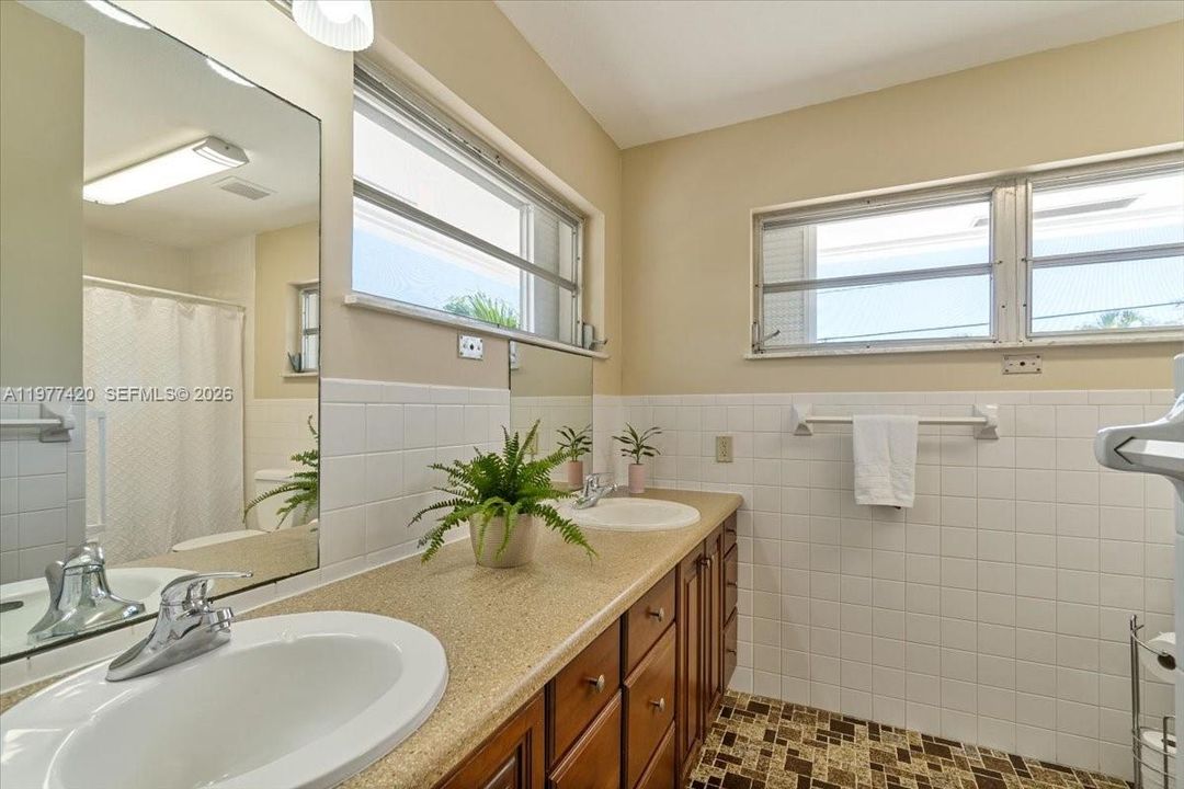 Primary bathroom serving the main bedroom.