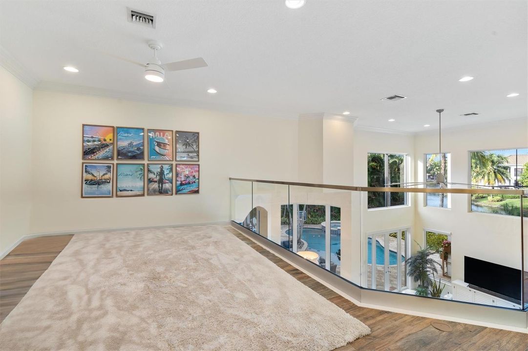 Loft with Glass and Metal Railing