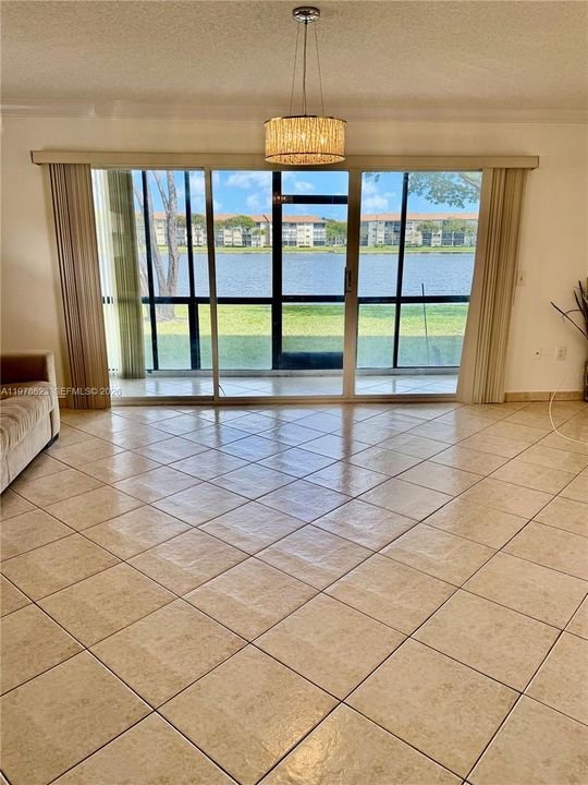 BEAUTIFUL GARDEN & LAKE VIEWS FROM KITCHEN, DINING & LIVING AREA & PRIMARY BEDROOM SUITE