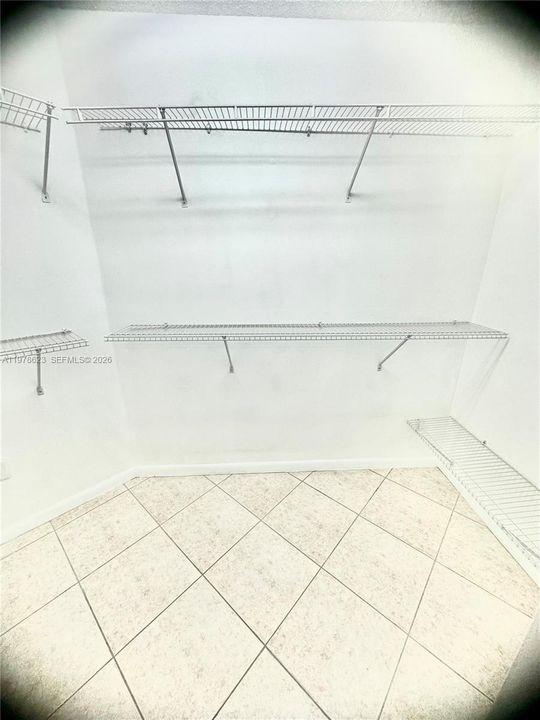 STRAIGHT THROUGH DOORS: MIDDLE OF WALK IN CLOSET