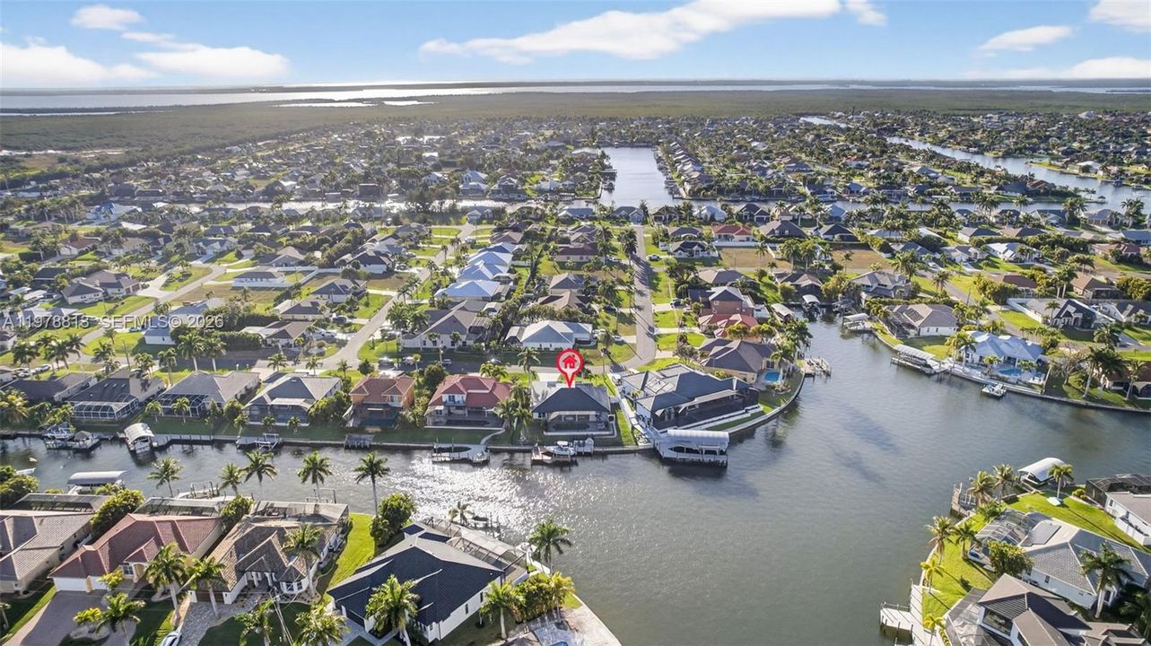 Aerial perspective of suburban area and well-maintained boating community