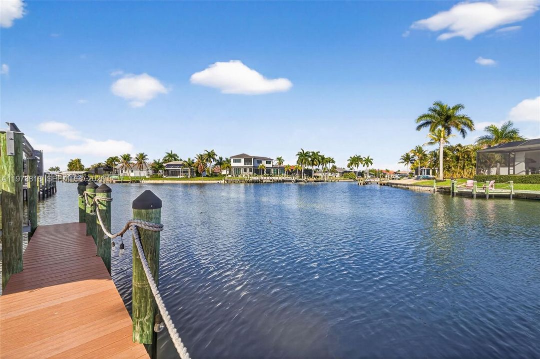 Wide canal, water view and a residential view