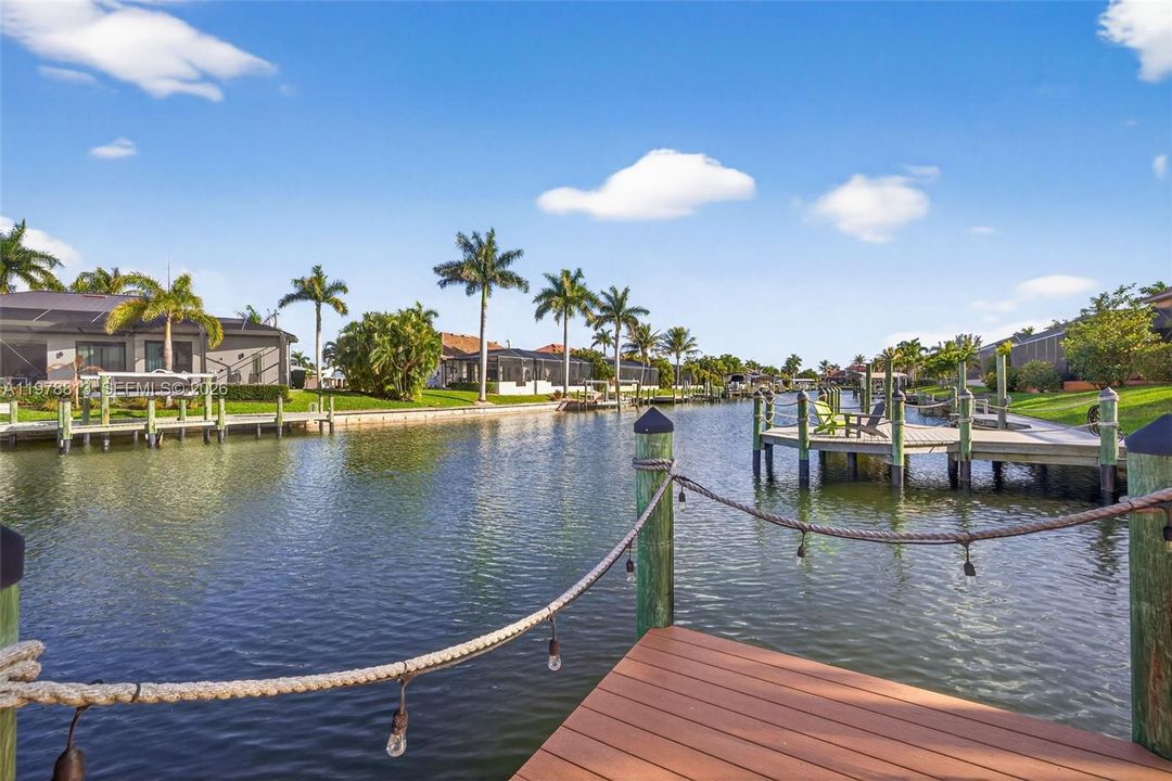 Dock area with lighting and a water views, gulf access