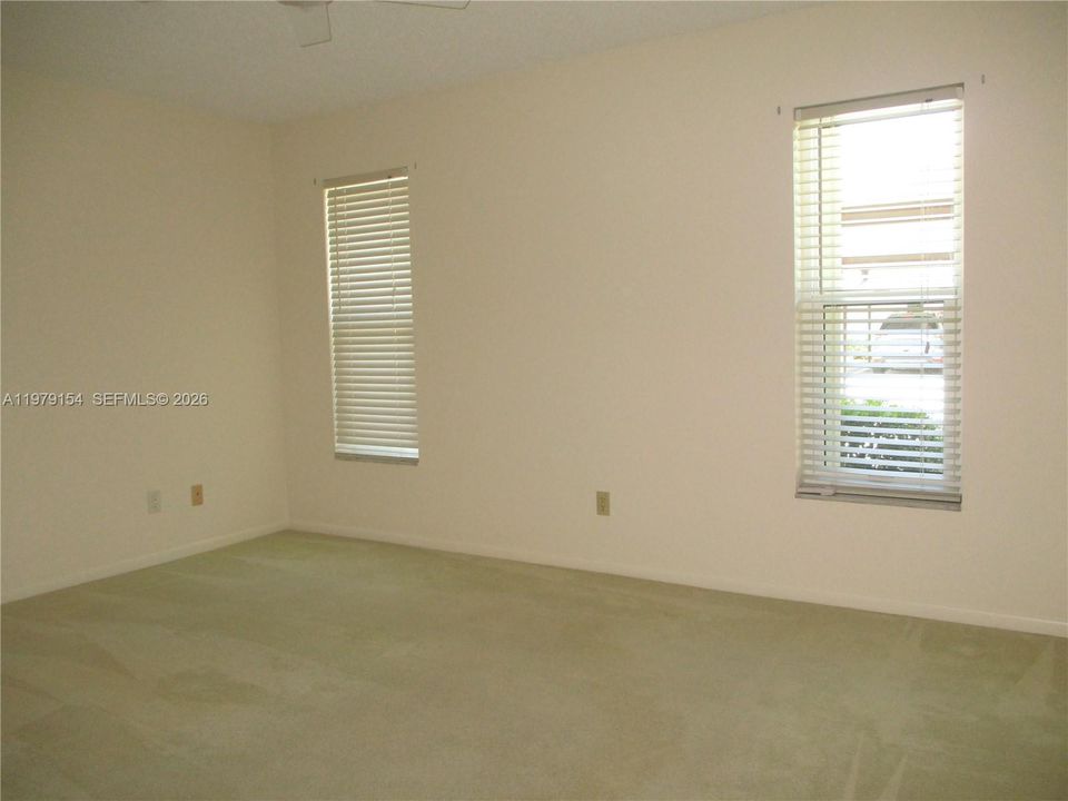 GUEST BEDROOM WITH TWO WINDOWS FOR MORNING SUN