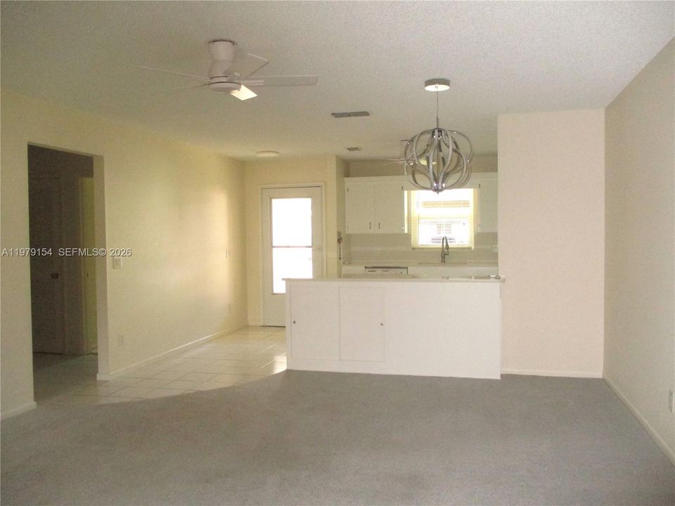 VIEW FROM PATIO TO LIVING/DINING AREA