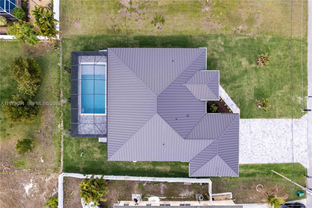 SCREENED LANAI provides PERFECT SETTING TO SWIM in SALTWATER POOL, or HOST UNFORGETTABLE BBQs while enjoying THE BEST OF SWFL LIVING!