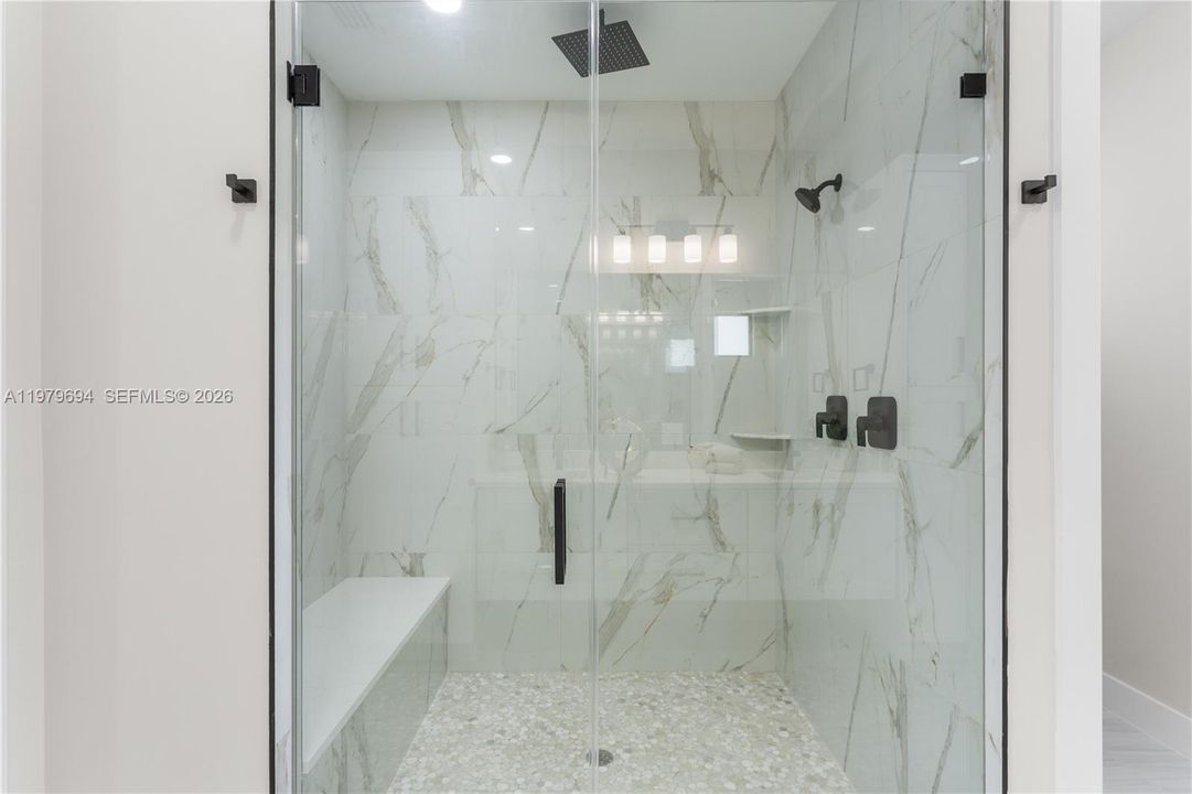 Private water closet & generous natural light create BRIGHT & SERENE RETREAT!