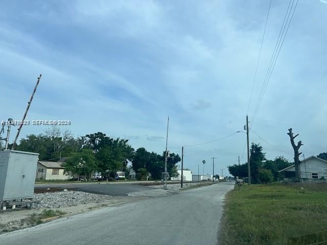 Land to the right and to left is train track