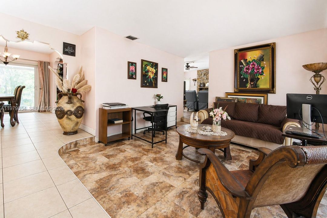 THIS IS THE VIEW AS YOU ENTER THE FRONT DOOR WHICH LEADS TO THE DINNING AND KITCHEN AREA