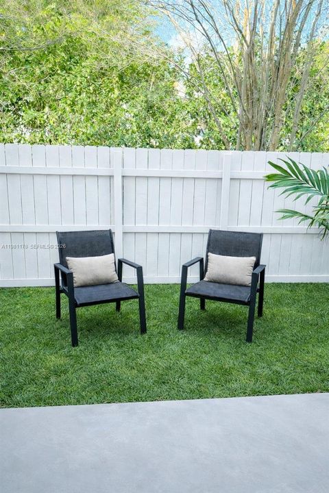 Yard is virtually staged.