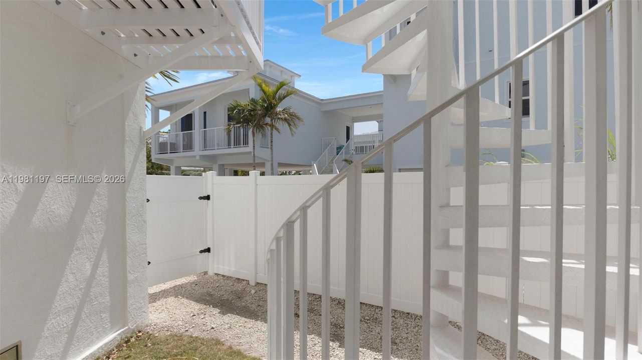 Exterior Spiral Stairs to First Floor Balcony
