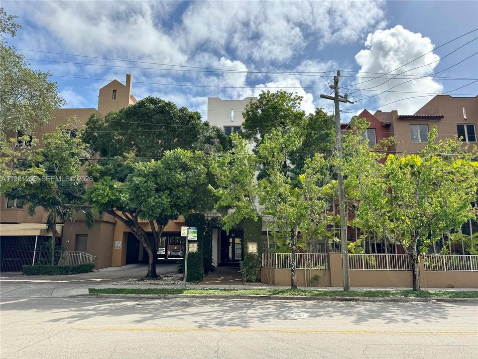 Located on a quiet tree-lined street east of US Highway 1 yet just steps from the Metrorail station at Coconut Grove.