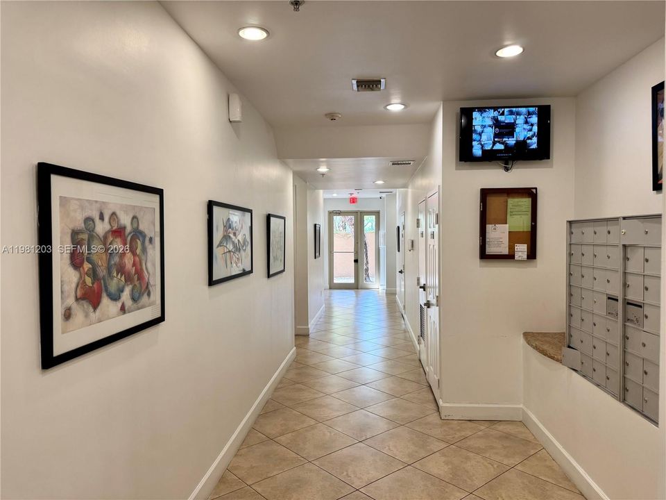 Secured mail room with CCTV for package deliveries.