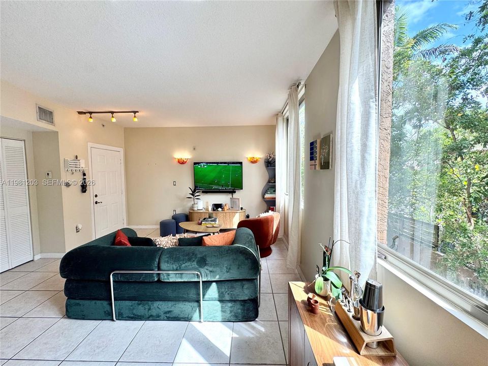 Abundant natural light streams through large formatted impact windows all day.