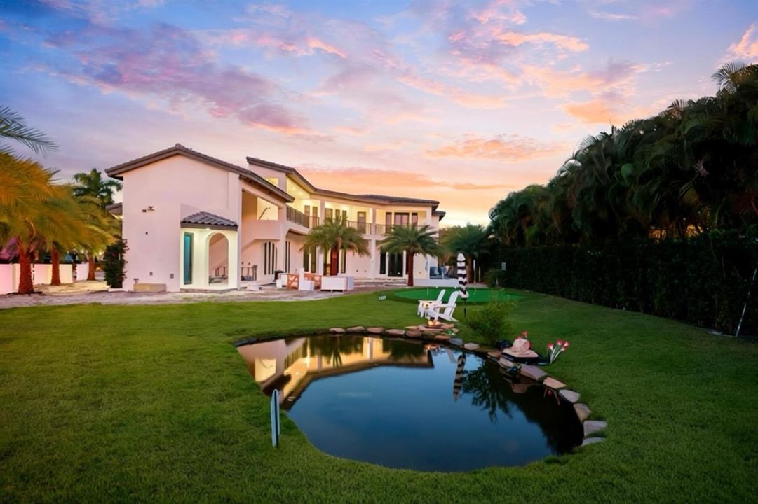 Expansive side yard & pond