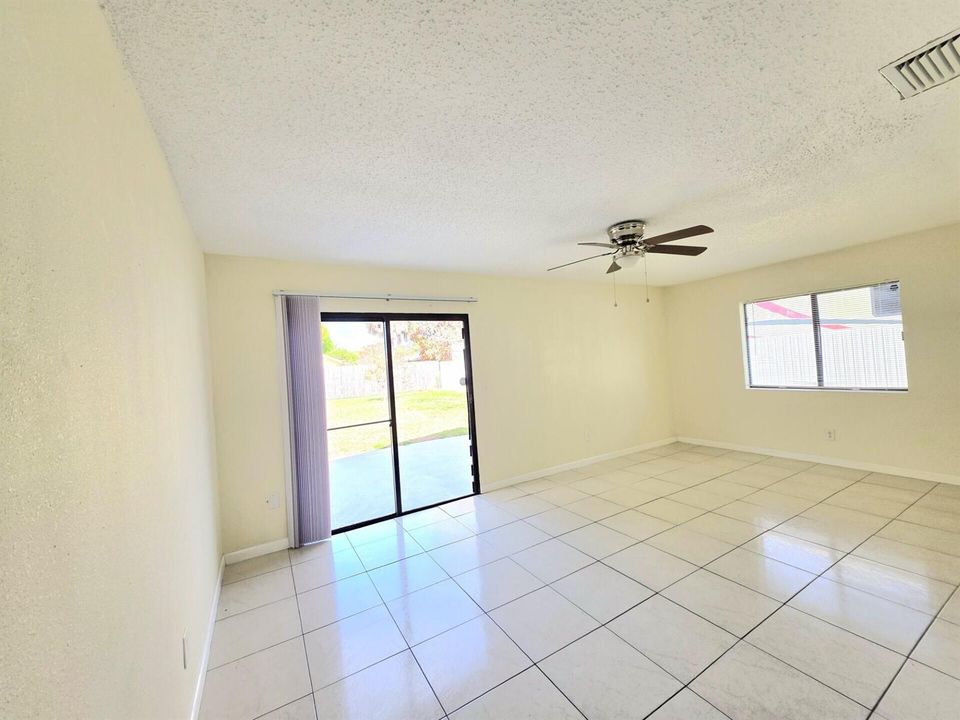 Living Rm with Slider to Huge Back Yard