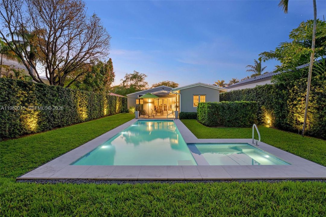 Ultra-private backyard with gorgeous podacarpus hedges.