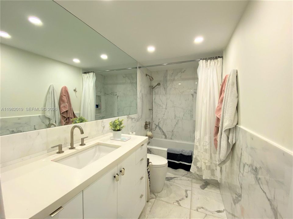 Guest Bathroom - Marble Quartz Counter Top - Recessed Lighting