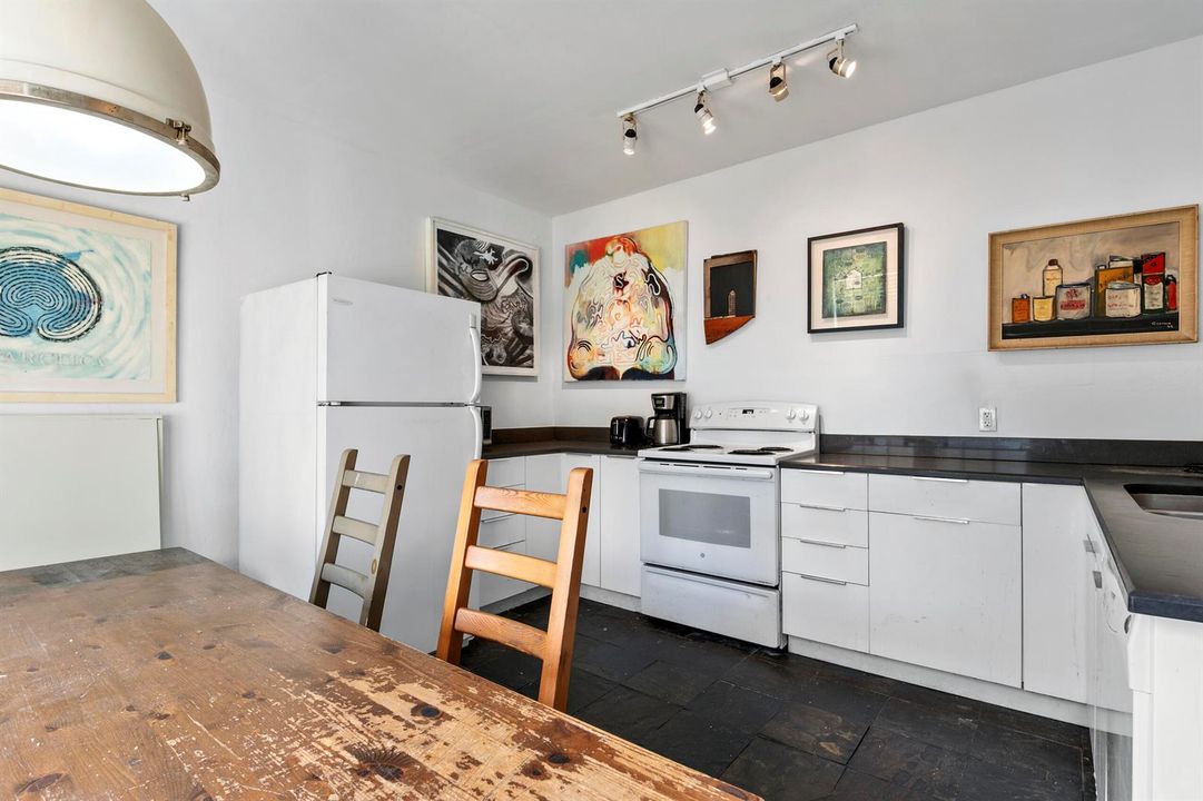 Kitchen includes track lighting