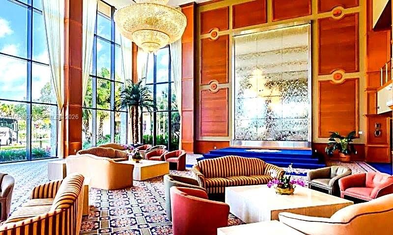Spacious clubhouse lobby seating area.