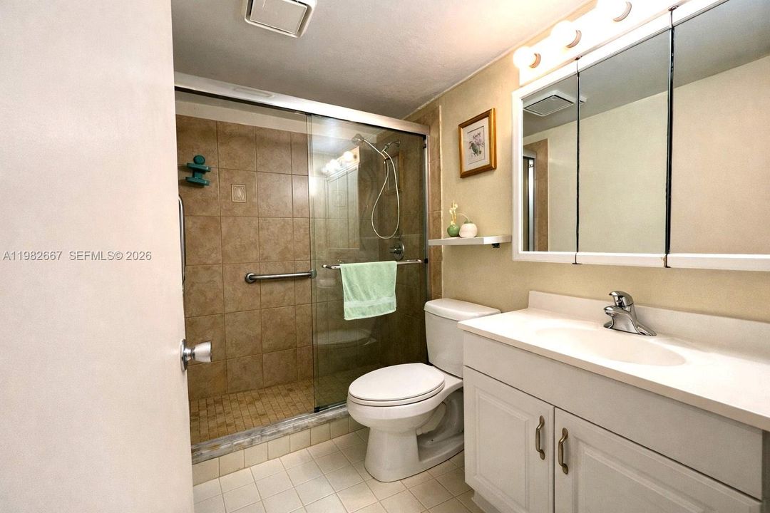 Clean and functional bathroom with shower.