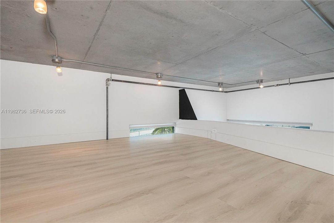 Built-in mezzanine provides space for overnight guests or storage area.