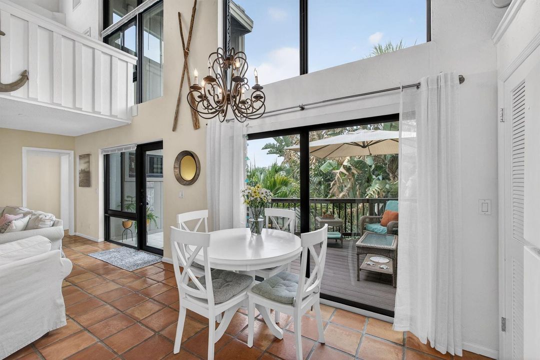 Dining with sunny courtyard views