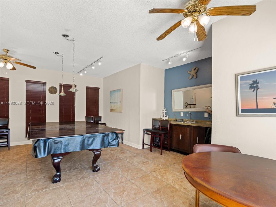 game room by pool