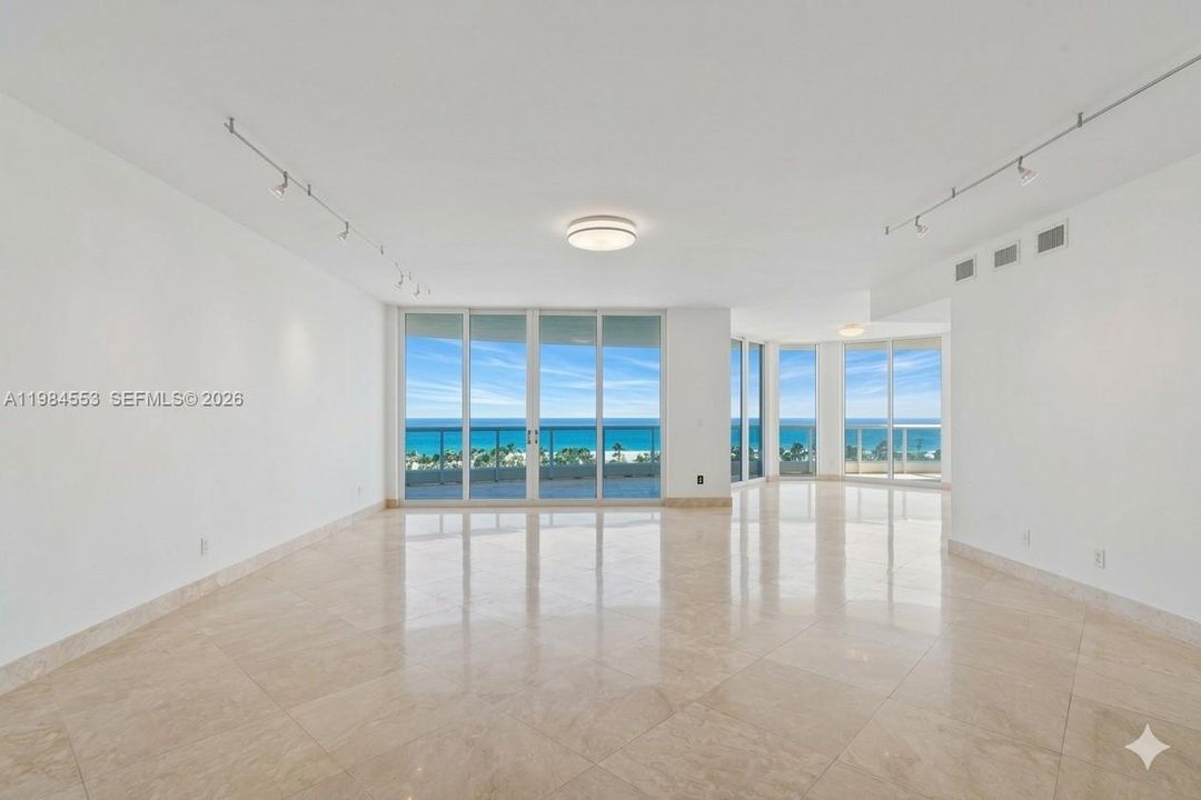 Furniture has been digitally removed to show the space unfurnished