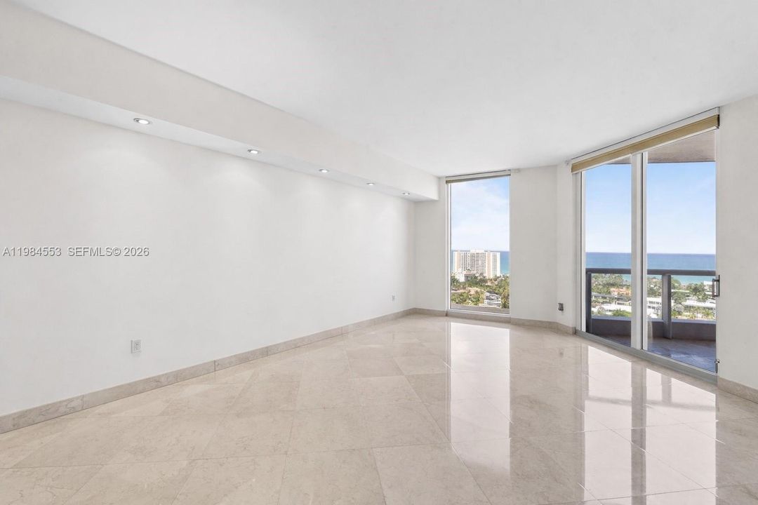 Furniture has been digitally removed to show the space unfurnished