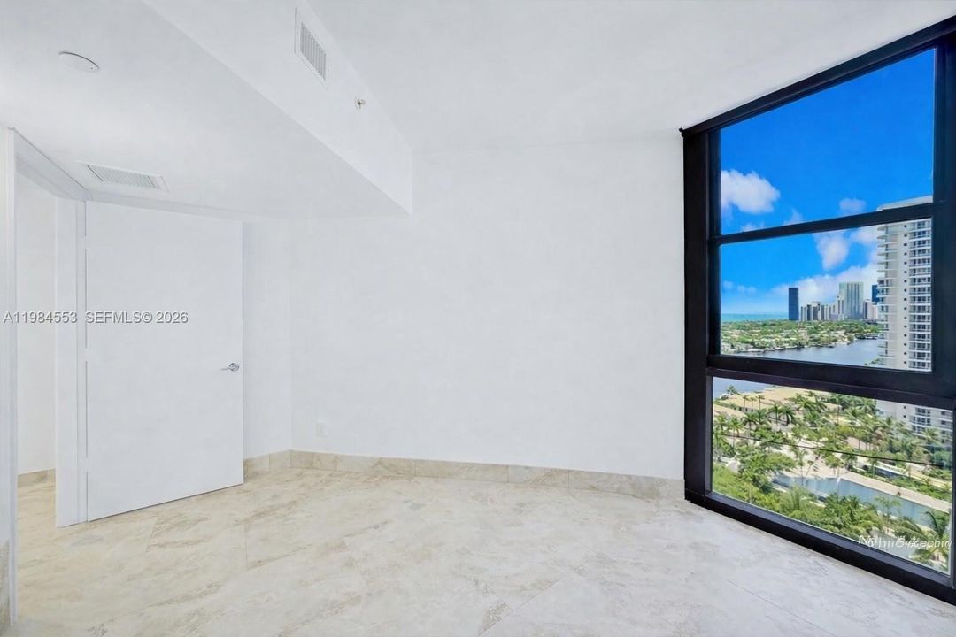 Furniture has been digitally removed to show the space unfurnished