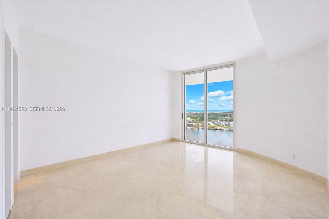 Furniture has been digitally removed to show the space unfurnished