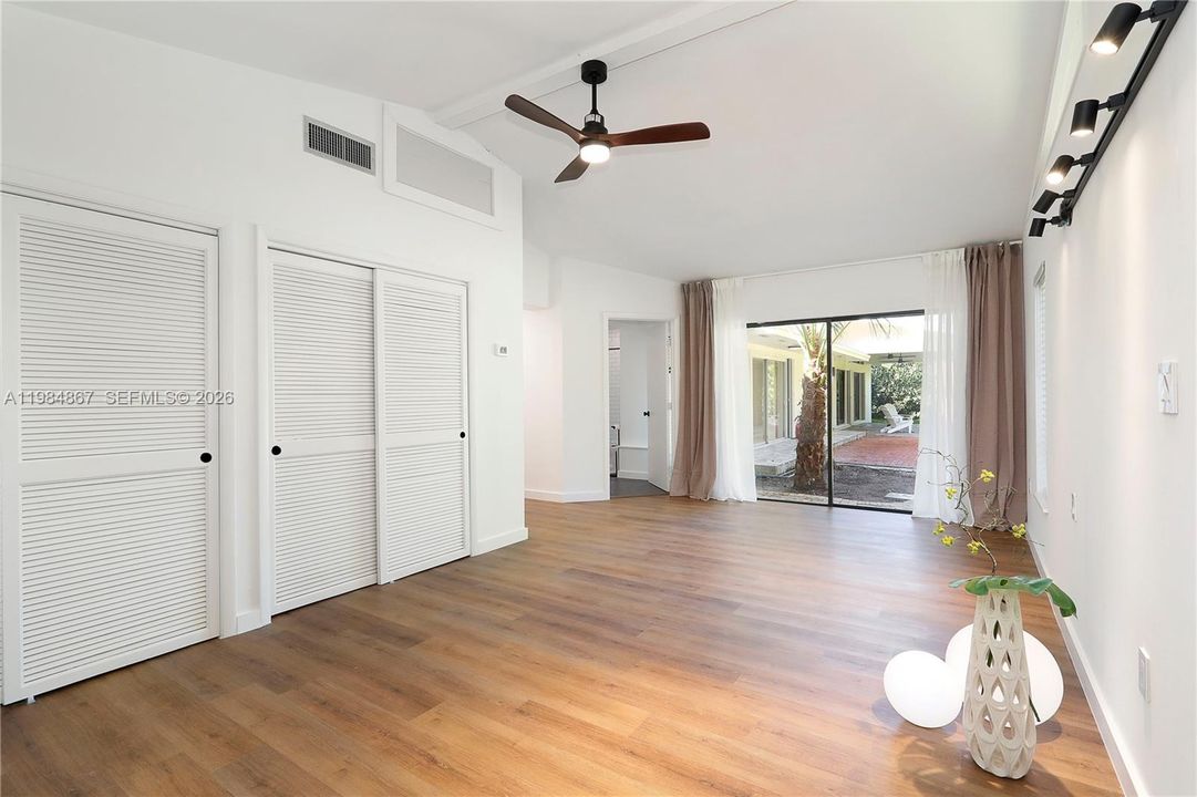 Master with ample closets and en-suite bath overlooking the garden