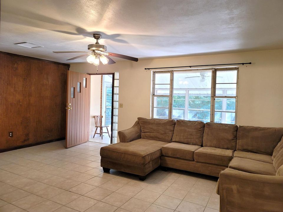 LIVING ROOM FRONT DOOR OPEN