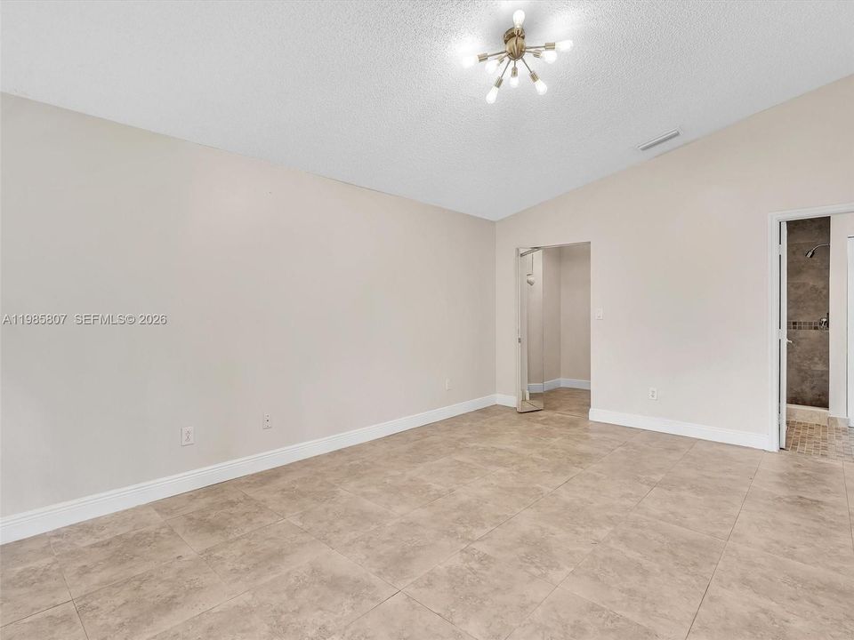 Primary bedroom different angle w/o furniture