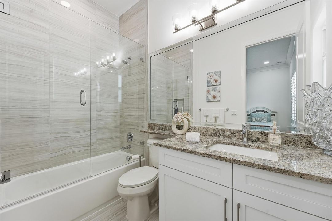 Tile to ceiling with frameless shower