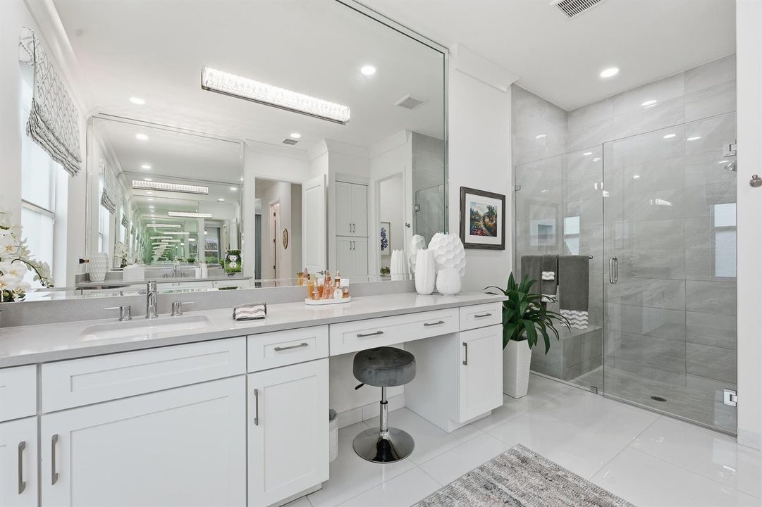 Double sinks, seamless shower doors