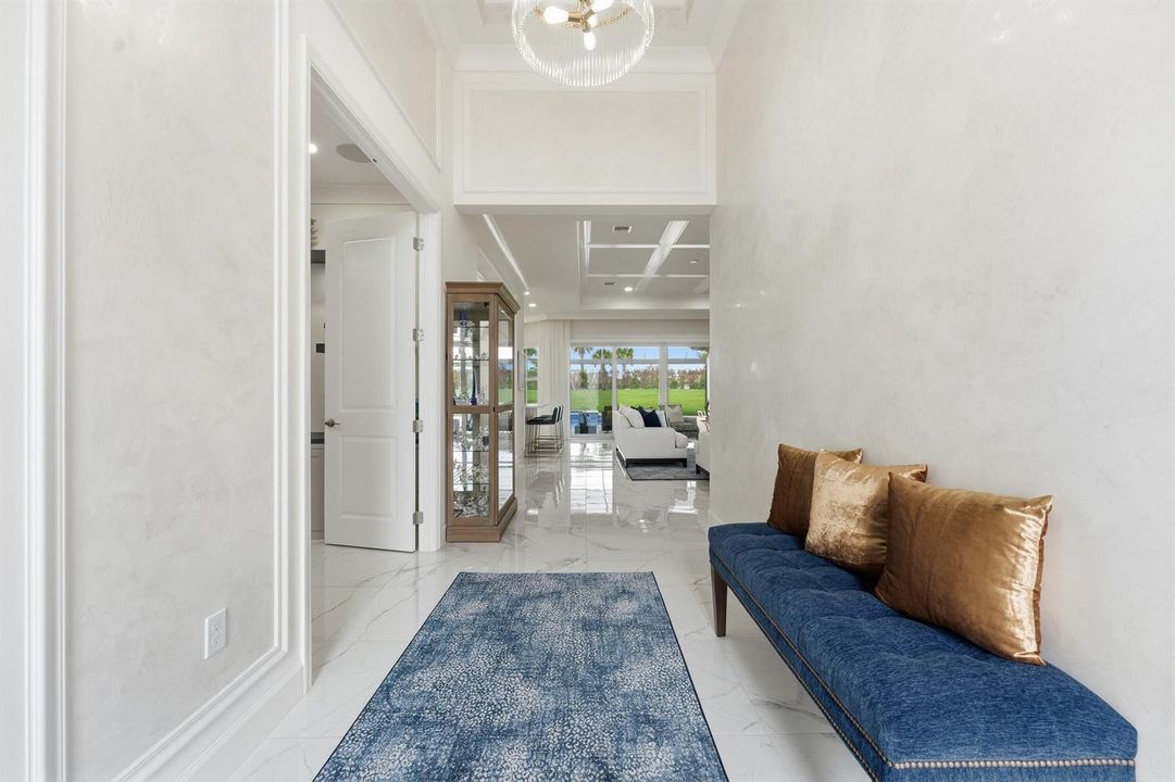 High ceiling foyer with faux paint